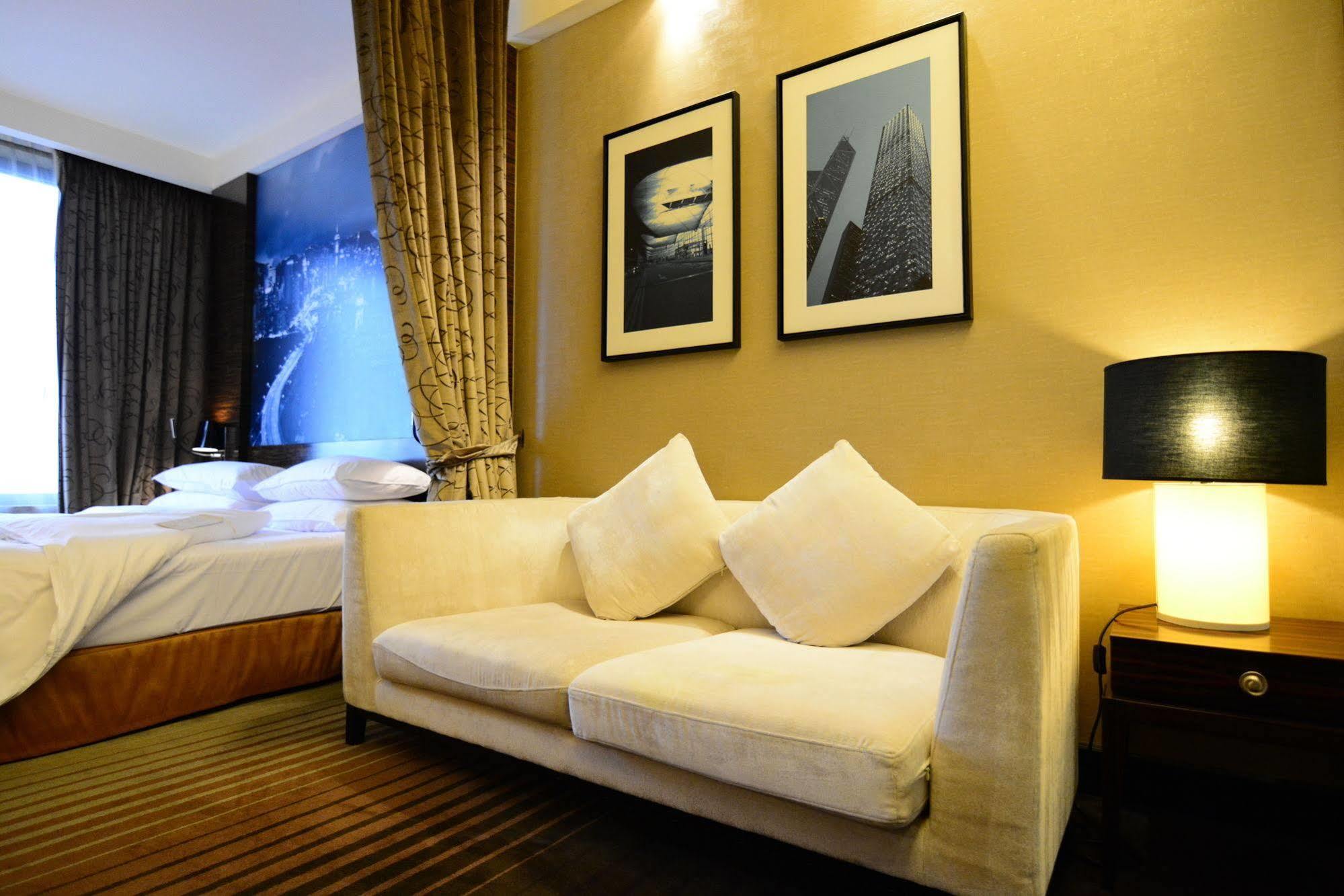Harbour Grand Hong Kong Hotel Exterior photo A room at the hotel